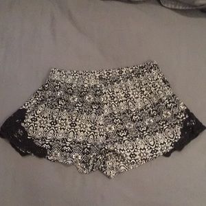 Soft, flowy tribal print shorts with lace insert